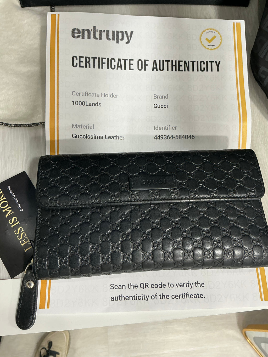 Portafoglio Gucci in pelle Guccissima nero [Preloved]