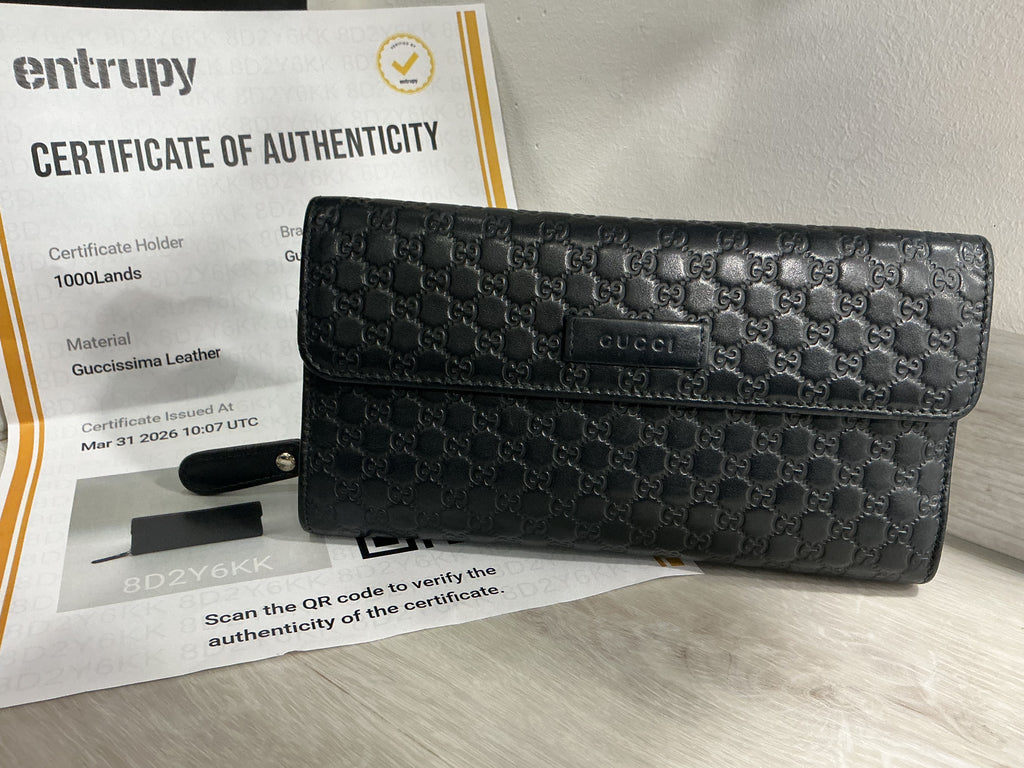 Portafoglio Gucci in pelle Guccissima nero [Preloved]
