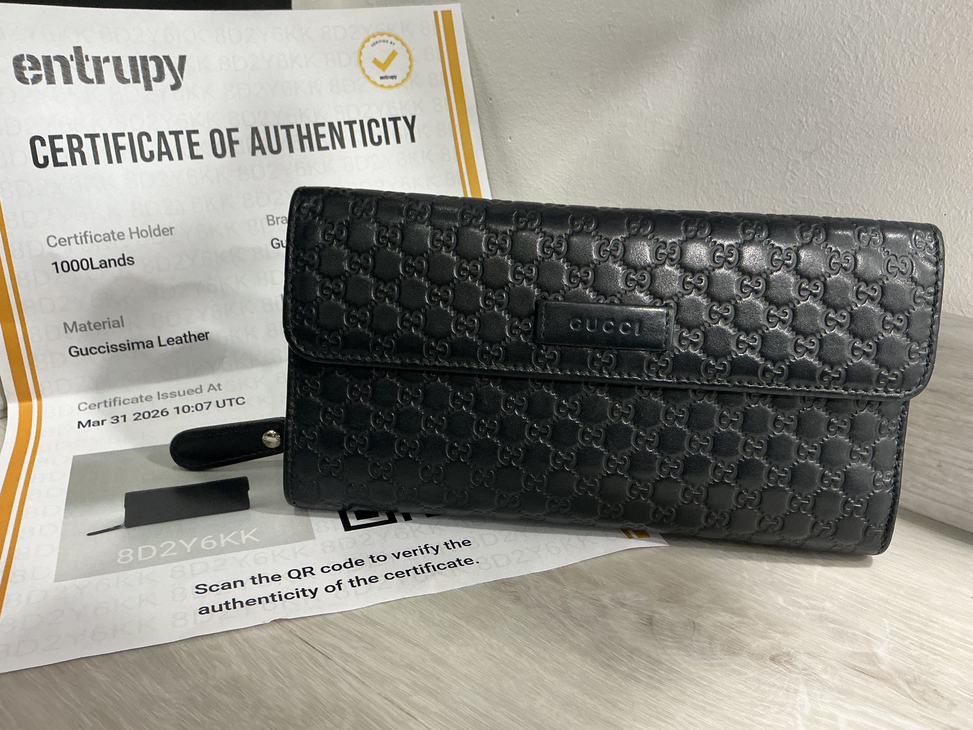 Portafoglio Gucci in pelle Guccissima nero [Preloved]