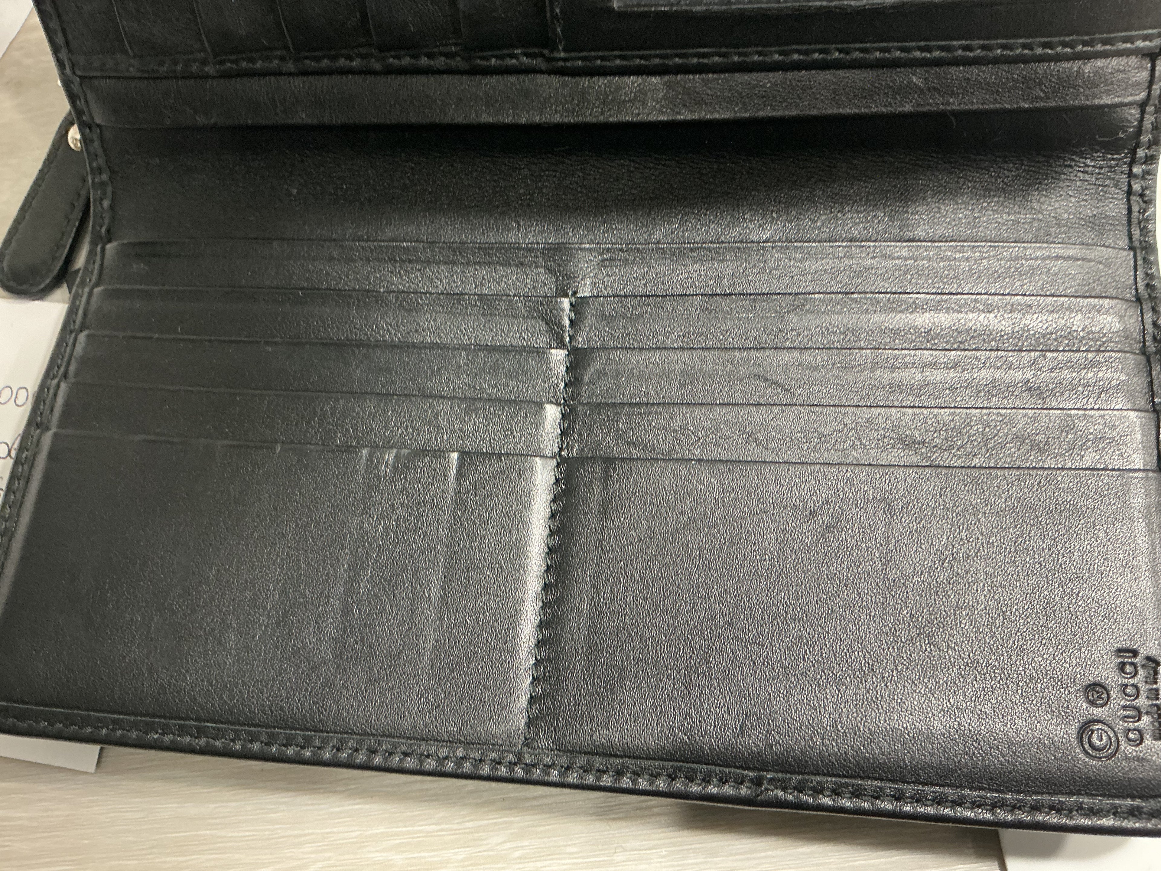Portafoglio Gucci in pelle Guccissima nero [Preloved]