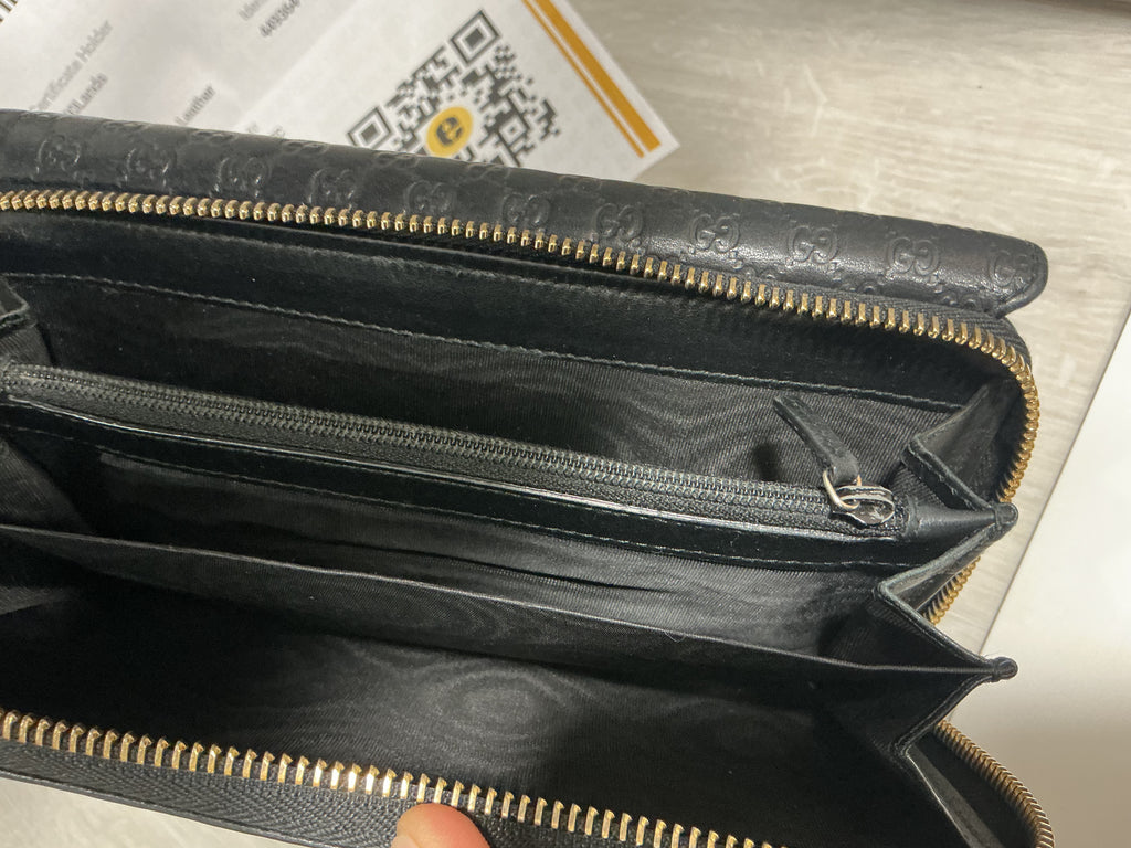 Portafoglio Gucci in pelle Guccissima nero [Preloved]
