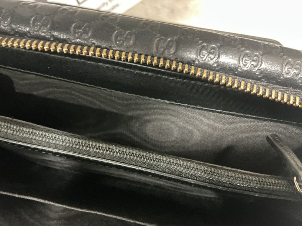 Portafoglio Gucci in pelle Guccissima nero [Preloved]