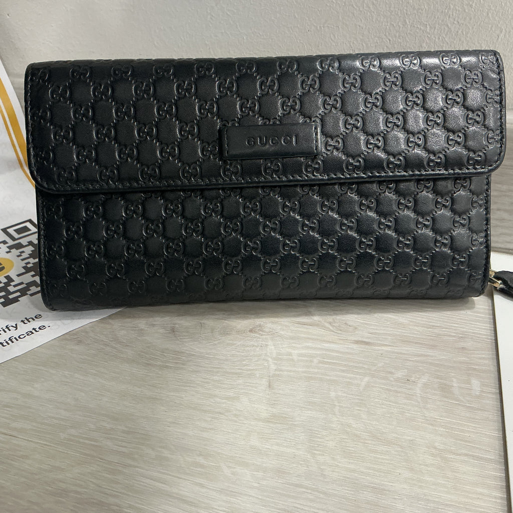 Portafoglio Gucci in pelle Guccissima nero [Preloved]
