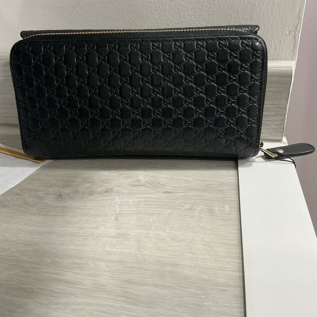 Portafoglio Gucci in pelle Guccissima nero [Preloved]