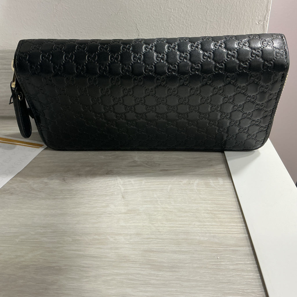 Portafoglio Gucci in pelle Guccissima nero [Preloved]