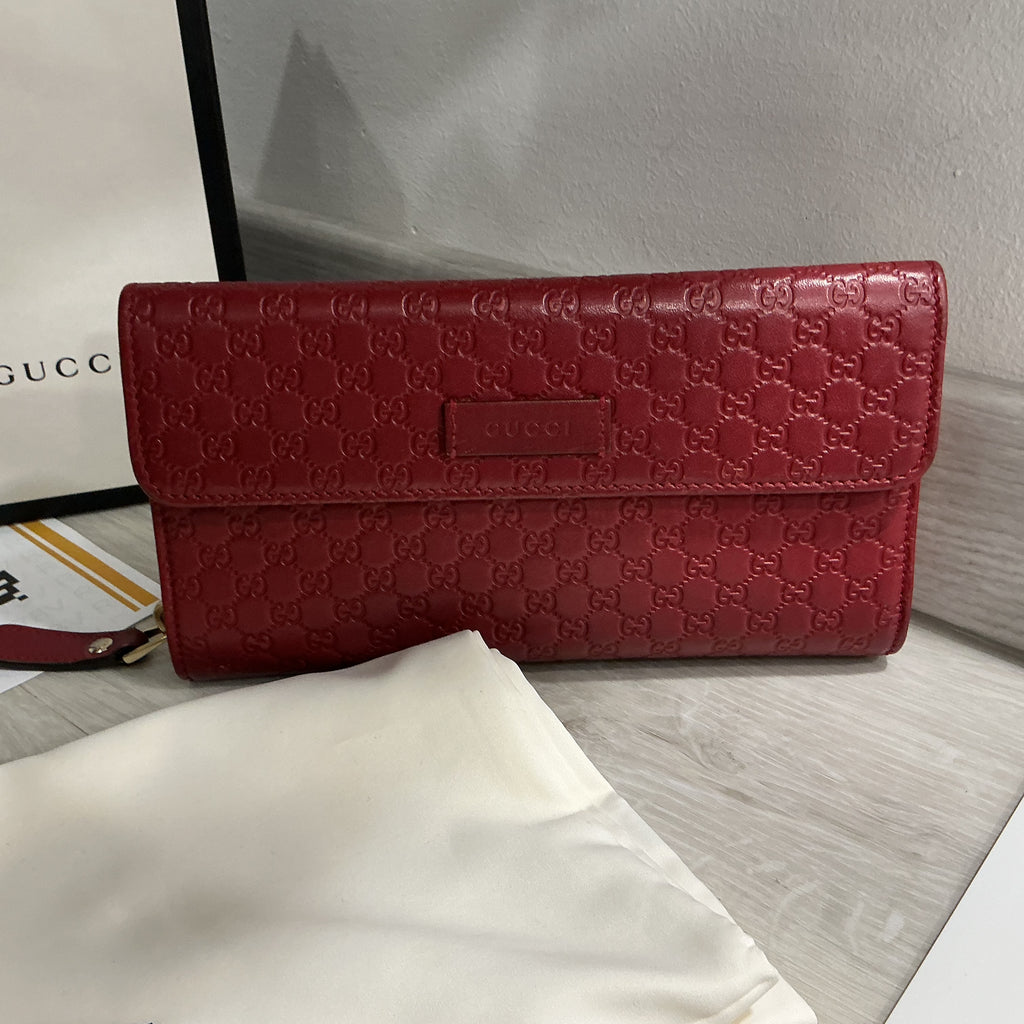 Portafoglio Gucci in pelle Guccissima bordeaux [Preloved]