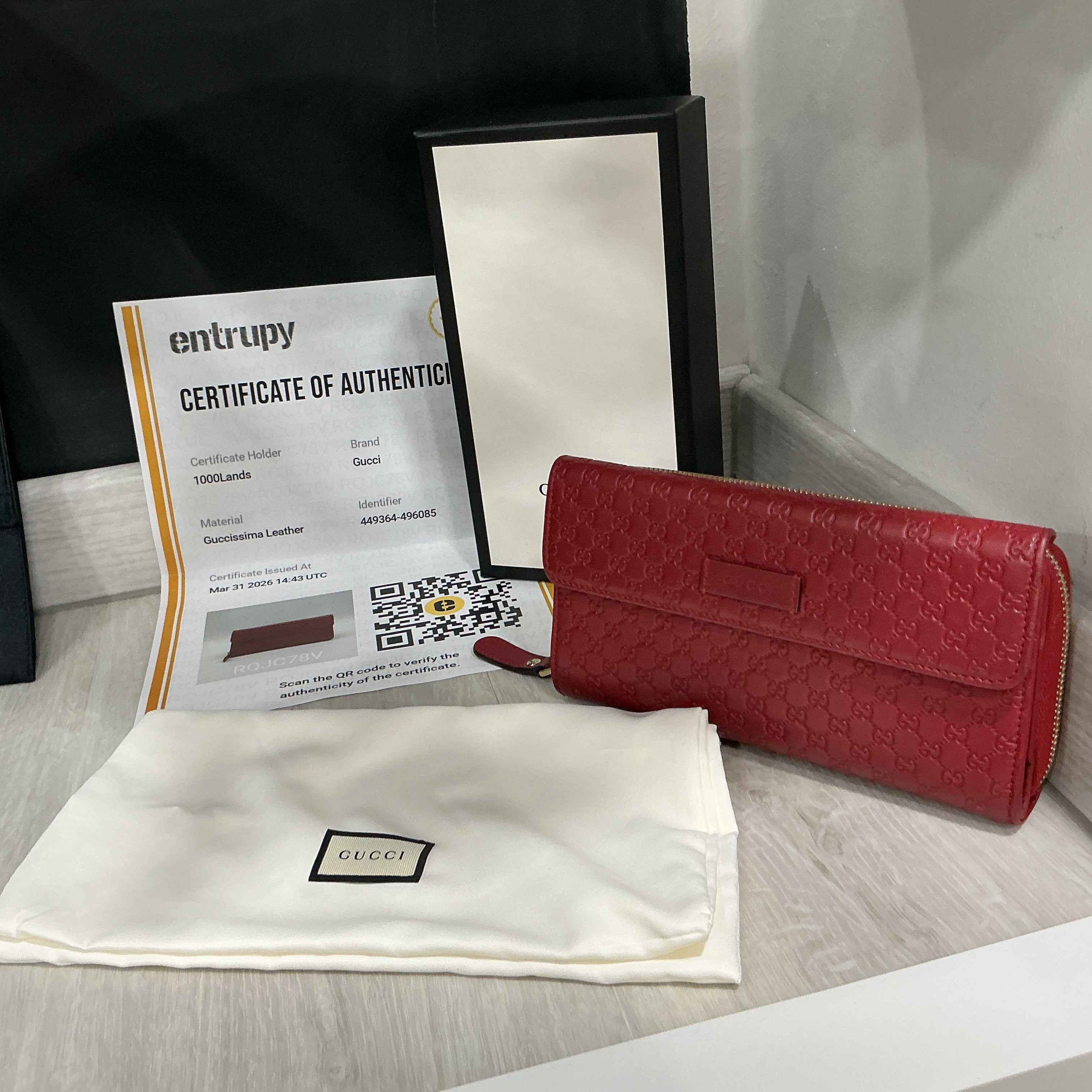 Portafoglio Gucci in pelle Guccissima bordeaux [Preloved]