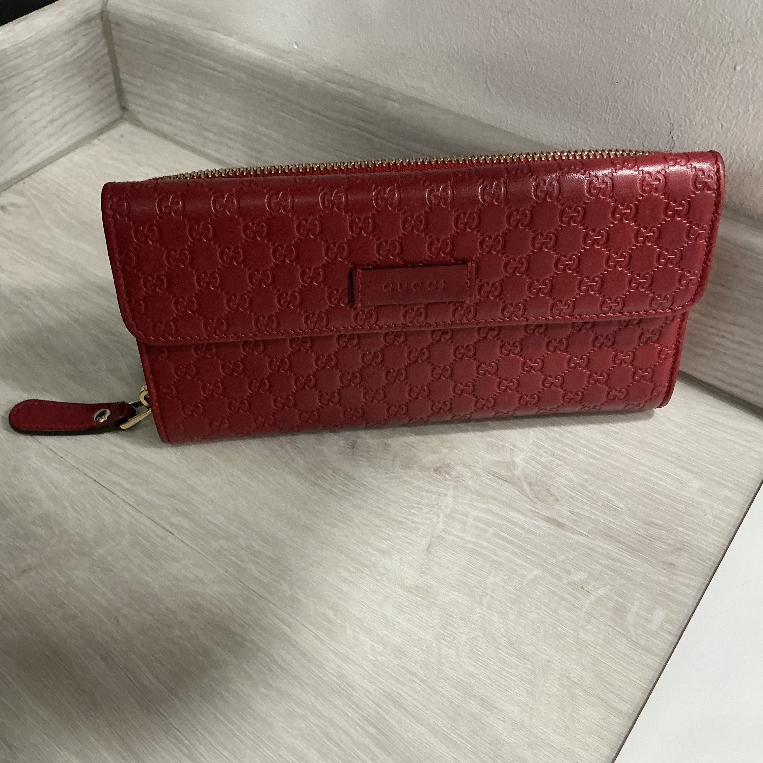 Portafoglio Gucci in pelle Guccissima bordeaux [Preloved]