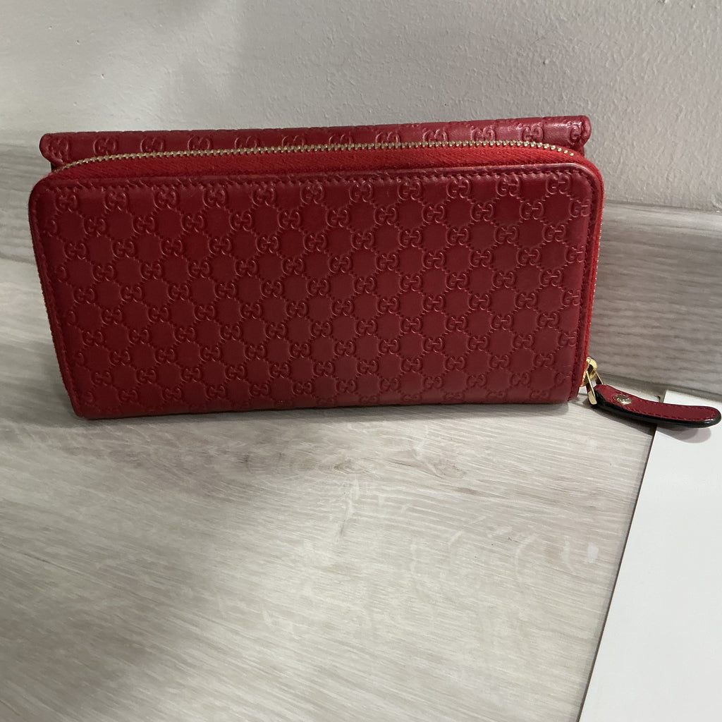 Portafoglio Gucci in pelle Guccissima bordeaux [Preloved]