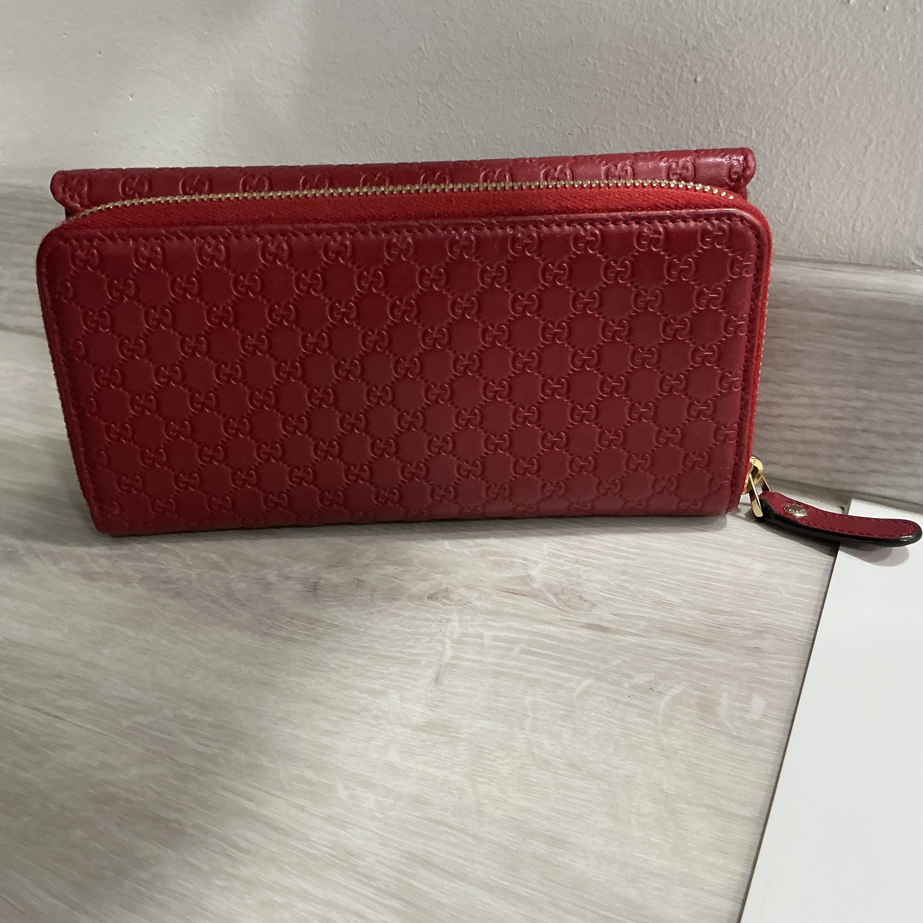 Portafoglio Gucci in pelle Guccissima bordeaux [Preloved]