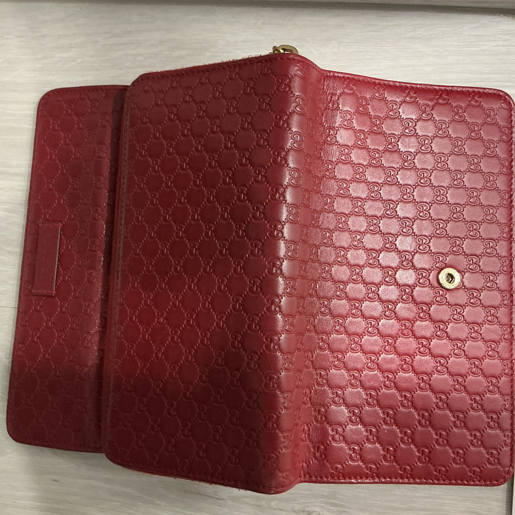 Portafoglio Gucci in pelle Guccissima bordeaux [Preloved]