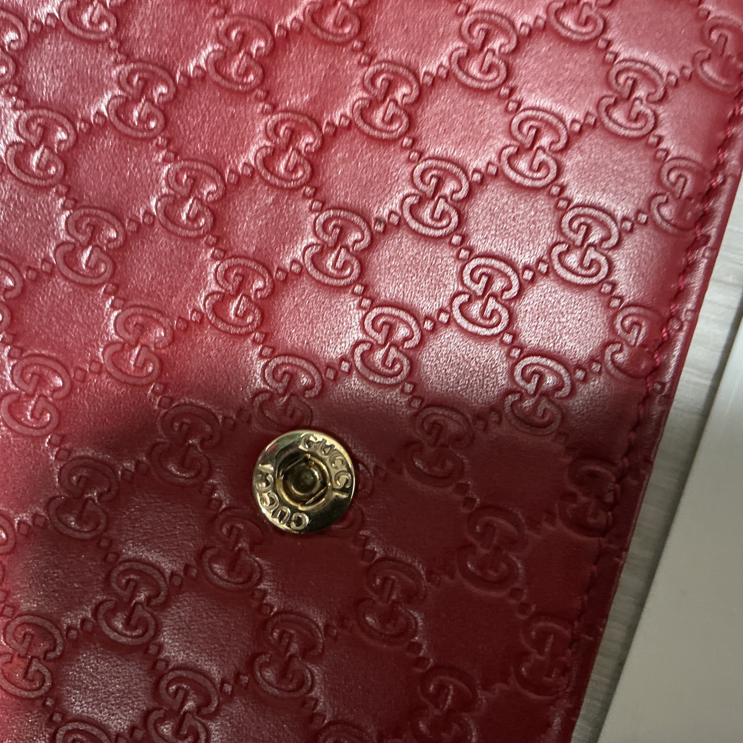 Portafoglio Gucci in pelle Guccissima bordeaux [Preloved]