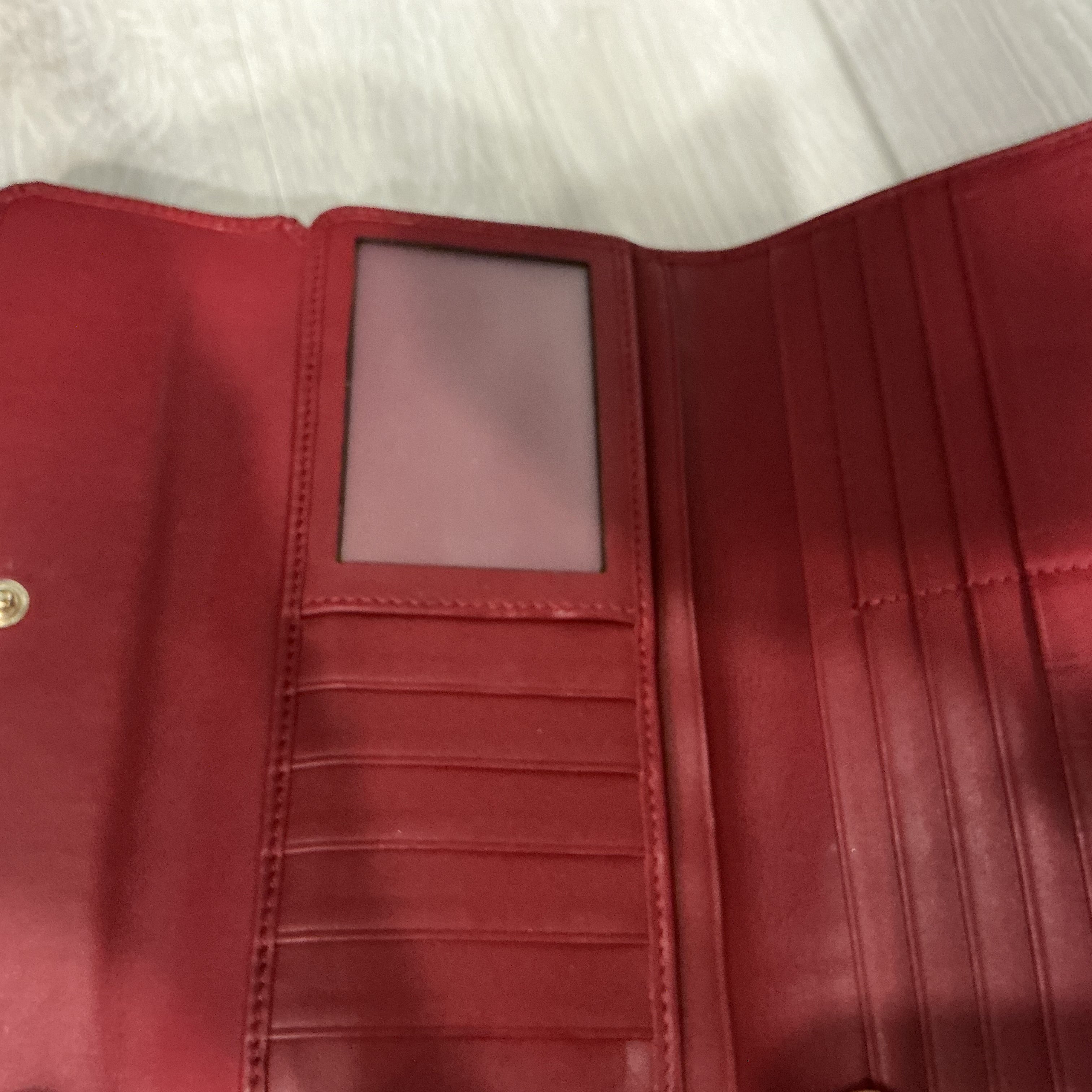 Portafoglio Gucci in pelle Guccissima bordeaux [Preloved]