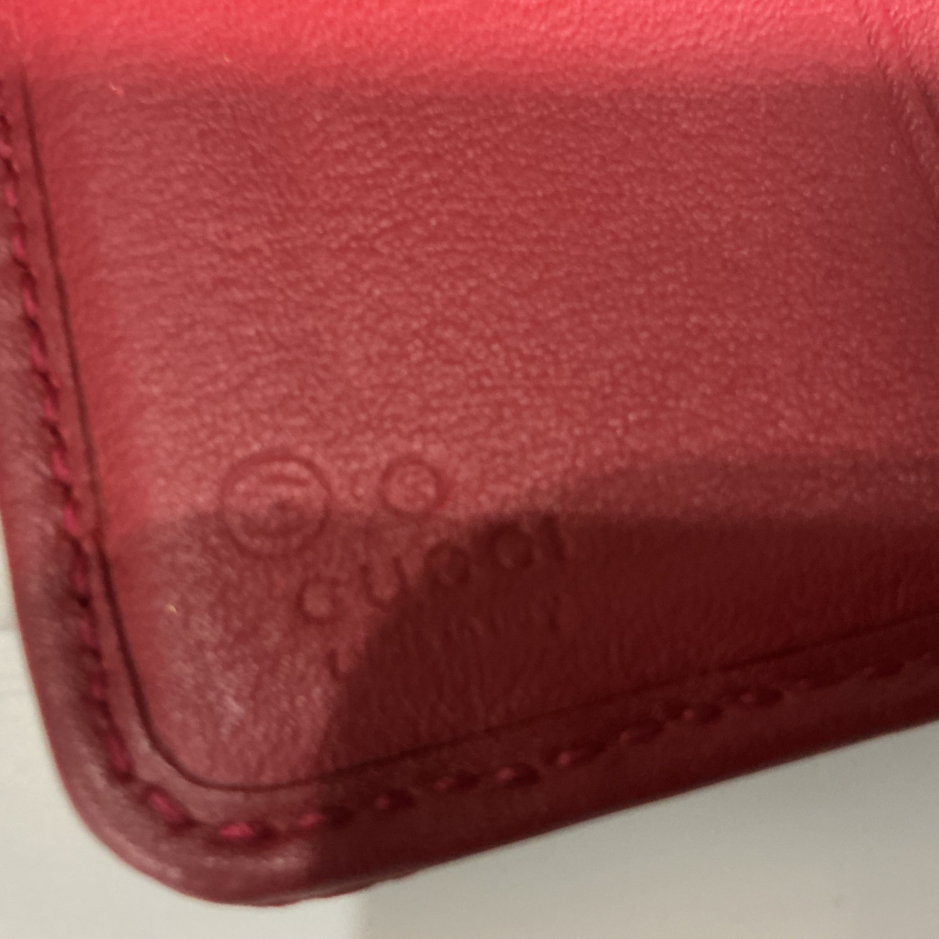 Portafoglio Gucci in pelle Guccissima bordeaux [Preloved]