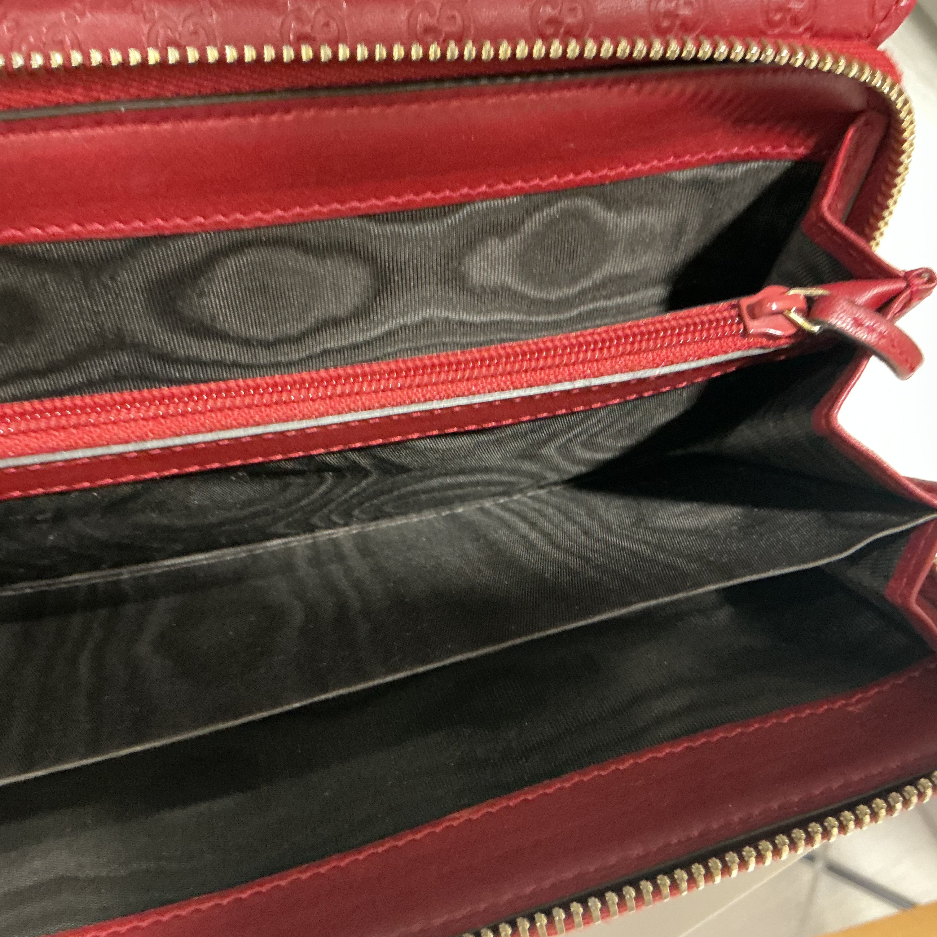 Portafoglio Gucci in pelle Guccissima bordeaux [Preloved]