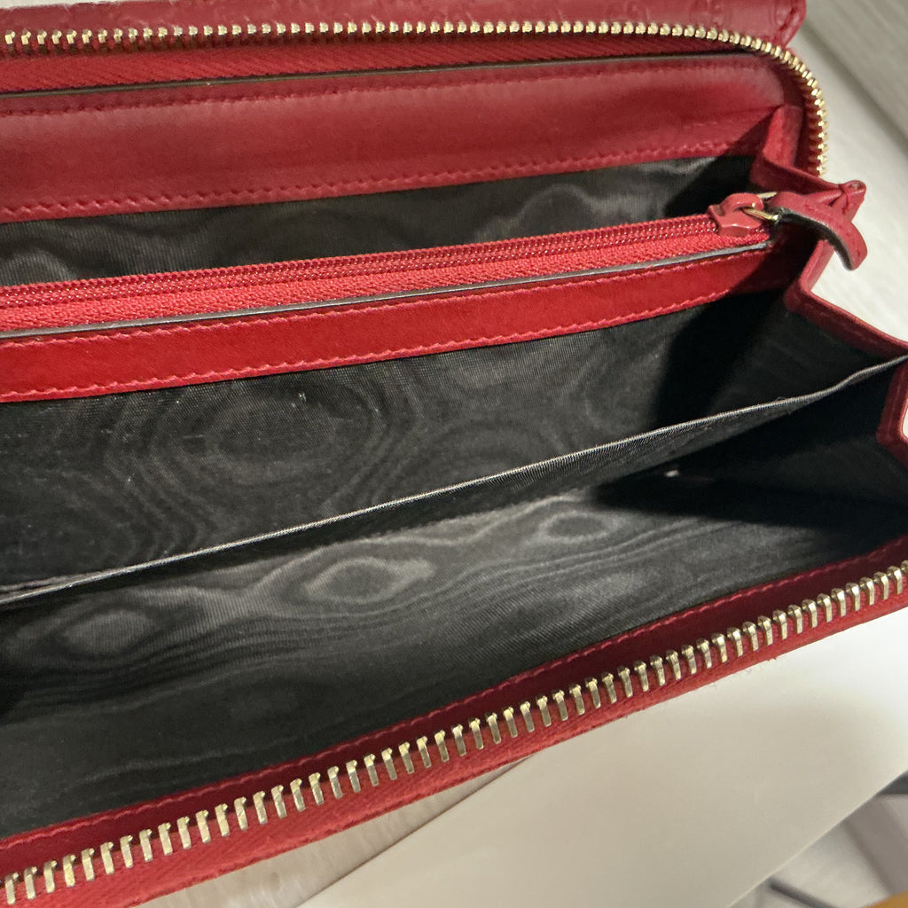 Portafoglio Gucci in pelle Guccissima bordeaux [Preloved]