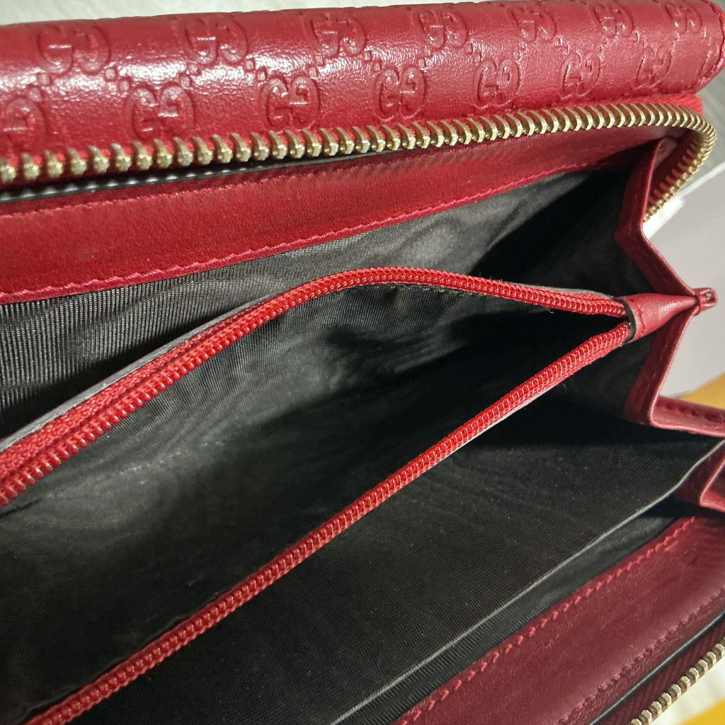 Portafoglio Gucci in pelle Guccissima bordeaux [Preloved]